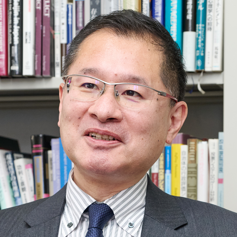 堀田 昌英 氏